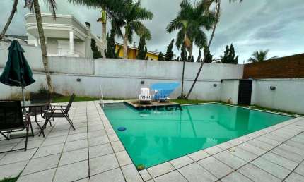 Casa à venda em Condomínio de Alto Padrão no Guarujá | OMEGA IMÓVEIS