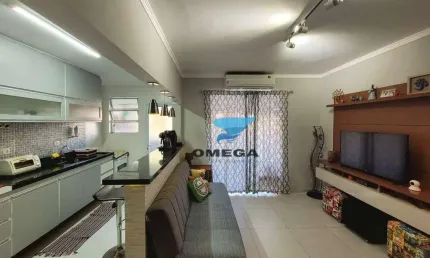 Apartamento à venda na praia do Tombo em Guarujá | Omega Imóveis