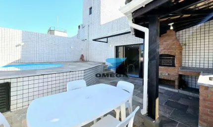 Cobertura â Venda na Praia do Tombo no Guarujá I Omega Imóveis