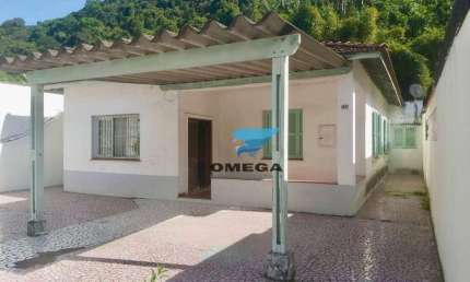 Casa à venda nas Pitangueiras no Guarujá | Omega Imóveis
