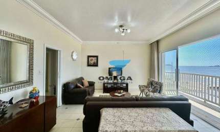 Apartamento frente mar à venda na praia das Pitangueiras no Guarujá I Omega Imoveis