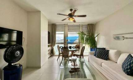 Apartamento beira mar à venda na praia das Pitangueiras no Guarujá I Omega Imoveis