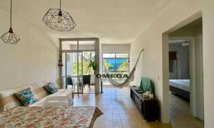 Apartamento à venda na praia do Tombo no Guarujá I Omega Imoveis