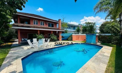 Casa à venda em Condomínio Jardim Acapulco no Guarujá | Omega Imóveis