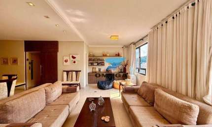 Apartamento à venda na praia das Pitangueiras no Guarujá I Omega Imoveis