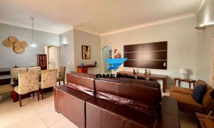Apartamento reformado à venda na praia das Pitangueiras no Guarujá I Omega Imoveis