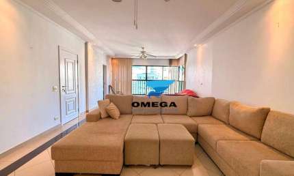 Apartamento à venda na praia das Pitangueiras no Guarujá I Omega Imoveis
