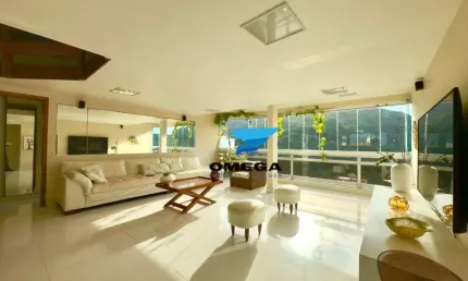 Apartamento beira mar à venda na praia das Pitangueiras no Guarujá I Omega Imoveis