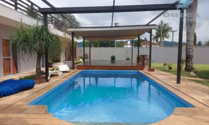 Casa à Venda no Condomínio Jardim Acapulco no Guarujá | Omega Imóveis