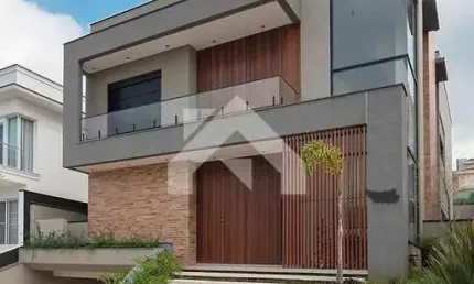 Luxuosa Casa em Alphaville: 4 Suítes e 420m² por R$4,2M