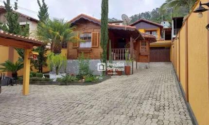 Casa linear com 2 dormitórios à venda, 116 m² por R$ 640.000 - Jardim Califórnia - Nova Friburgo/RJ