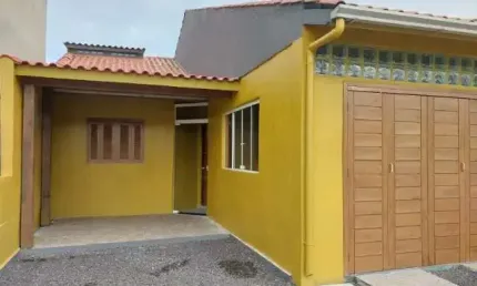 Casa 2 quartos,  2 vagas de garagem e churrasqueira,  Bairro Zona Norte em Capão da Canoa