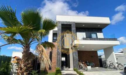 CASA ALTO PADRÃO COM 5 SUÍTES, 4 VAGAS, PISCINA AQUECIDA, CHURRASQUEIRA E MUITO MAIS EM CAMBORIÚ -SC.