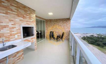 Apartamento próximo ao mar com vista da sacada com churrasqueira carvão, 02 dormitórios sendo 01 suíte 02 vagas em Itapema -SC.