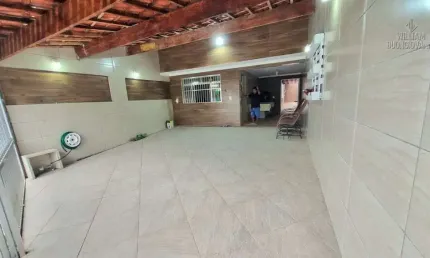 Casa espetacular à uma quadra da praia com dois quartos sendo uma suíte