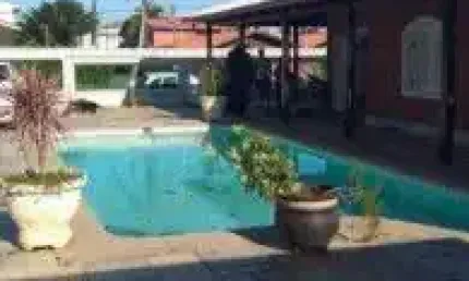Casa no bairro Cibratel 1, em Itanhaém - sendo lado praia, em rua calçada.