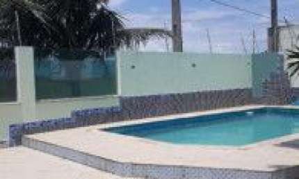 Casa no bairro Cibratel 2, em Itanhaém - ficando frente ao mar, em rua pavimentada.