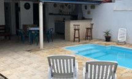 Casa no bairro Cibratel 2, em Itanhaém - sendo lado praia, em rua calçada.