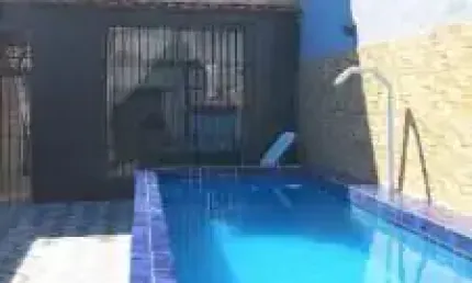 Linda casa localizada no bairro Balneário Tupy - lado praia