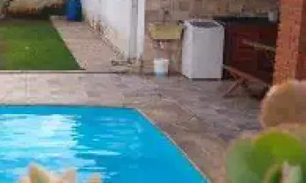 Belíssima casa localizada no bairro Balneário Gaivota, em Itanhaém - Possui piscina com cascata, edícula, área gourmet com churrasqueira.