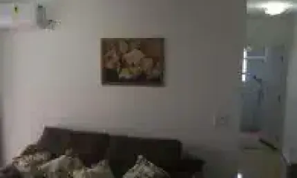 Apartamento no bairro Guapura, em Itanhaém - Possui elevador, piscina, mini academia, brinquedoteca, salão de jogos, salão de festas, mini campo e sacada.