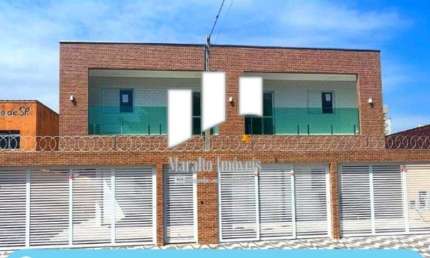 Casa em condominio nova 2 dormitórios de frente com sacada, em Praia Grande S. Paulo..