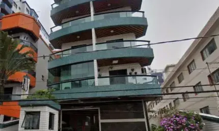 Apartamento à venda na Guilhermina, Praia Grande-SP: 2 quartos, 1 suíte, 1 sala, 2 banheiros, 1 vaga de garagem, 70m². Venha conferir!