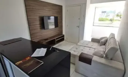 2 dormitorios 1 vaga e sacada com churrasqueira , semi mobiliado