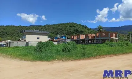 Lote em ubatuba, 700 metros praia da maranduba, com escritura, 590m² de esquina e aterrado