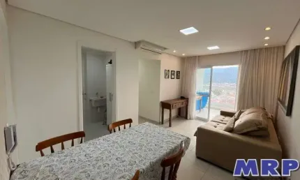 Apartamento com dois dormitórios em caraguatatuba. praia do indaiá. com varanda gourmet.