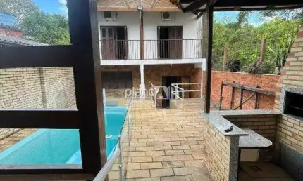 Casa à venda, com 170m², 3 quartos - Dom Feliciano - Gravataí / RS por R$ 958.000,00