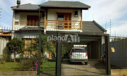 Casa de 03 dormitórios, sendo um suíte, no Bairro Salgado Filho em Gravataí - RS