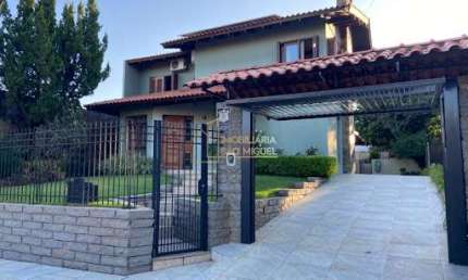 Casa com 4 quartos, 550m², à venda em Dois Irmãos, Centro
