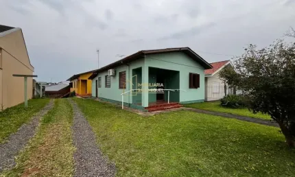 Vende-se Terreno com Duas Casas Próximo ao Centro de Dois Irmãos