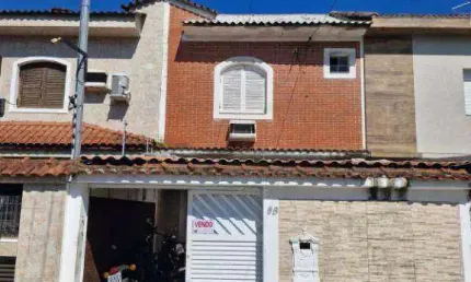Casa tipo sobrado com 2 dormitórios,2 banheiros, 2 vagas de garagem  à venda, 88 m² por R$ 900.000 - Aparecida - Santos/SP