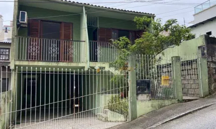 Sobrado com 4 dormitórios à venda, 143 m² por R$ 750.000,00 - Agronômica - Florianópolis/SC