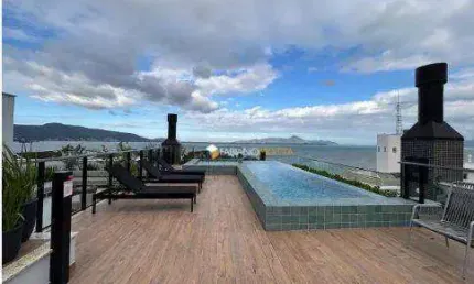 Studio com 1 dormitório para alugar, 47 m² por r$ 5.371,67/mês - coqueiros - florianópolis/sc
