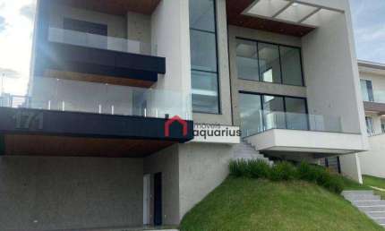 Sobrado com 4 dormitórios à venda, 440 m² por R$ 4.900.000,00 - Condomínio Reserva do Paratehy - São José dos Campos/SP