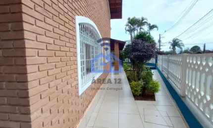 Casa à Venda no bairro Poiares - 3 dormitórios, sendo uma suíte, banheiro, sala com 2 ambiente, 3 v