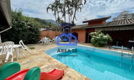 Sobrado à venda na Martim de Sá - 4 dormitórios, sendo 2 suítes, sala com 2 ambientes, lavabo, vaga