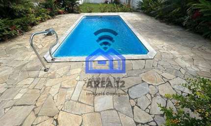 Casa com piscina à venda na Martim de Sá, 3 dormitórios, sendo 1 suíte, sala com dois ambientes, co