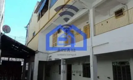 Sobrado triplex à venda no Centro de Caraguatatuba, SP - 5 dormitórios, sendo 2 suítes, 5 banheiros