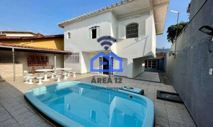 Sobrado com piscina à Venda no Indaiá com 4 dormitórios, sendo 2 suítes, 2 banheiros, sala com 3 am