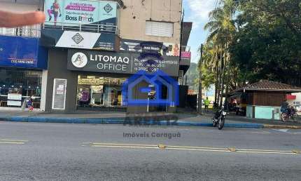 Ponto Comercial no Centro com 5  salas, sendo duas com banheiro, solário, cozinha, varanda, espaço