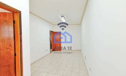 Sala comercial com 21m² para locação, localizada na região do Centro de Caraguatatuba, SP com 01 ba