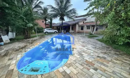 Casa à venda no bairro do Indaiá, com 03 dormitórios, sendo 01 suíte, piscina e quintal amplo em Ca