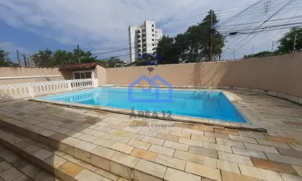 Casa à venda no bairro Jardim Aruan em Caraguatatuba, SP - 3 dormitórios sendo 1 suíte, piscina, ga