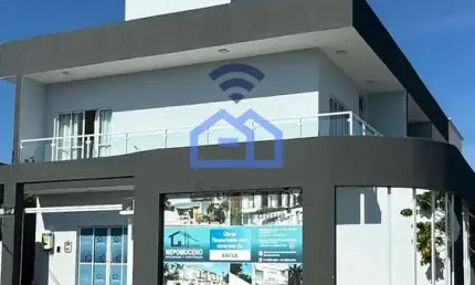 Sobrado à venda no bairro Golfinho, com 1 dormitório espaçoso, sala, cozinha, 2 banheiros e garagem