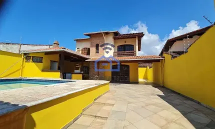 Casa ampla com piscina à venda no bairro indaiá em caraguatatuba, sp - 4 suítes, 6 banheiros, área