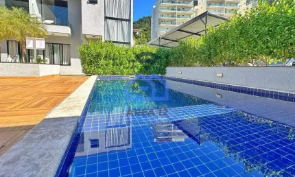 Sobrado à venda no bairro  Cidade Jardim em Caraguatatuba, SP - 02 Suítes, sala e cozinha integrado